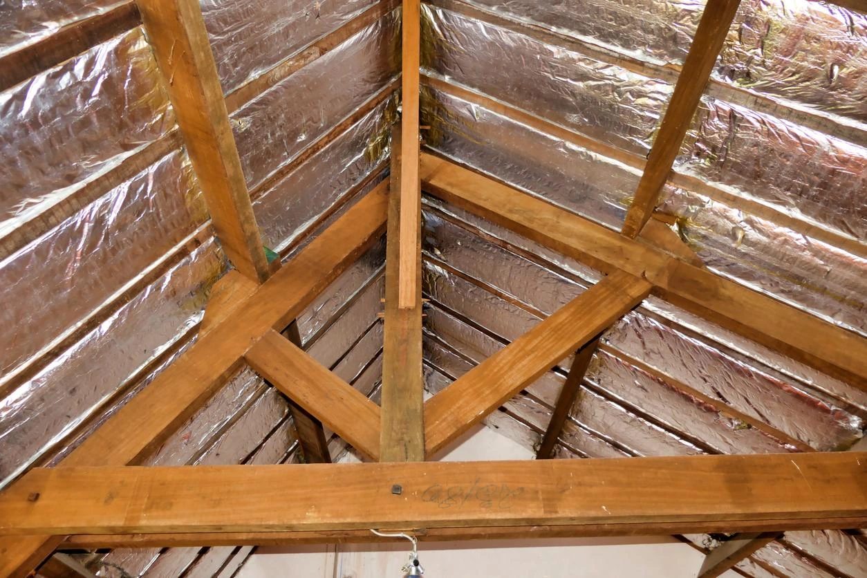 EcoTherm rigid PIR insulation board fitted neatly between the rafters of a Walsall loft